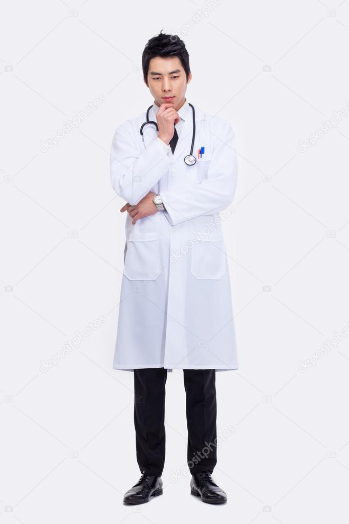 thinking Young Asian doctor.