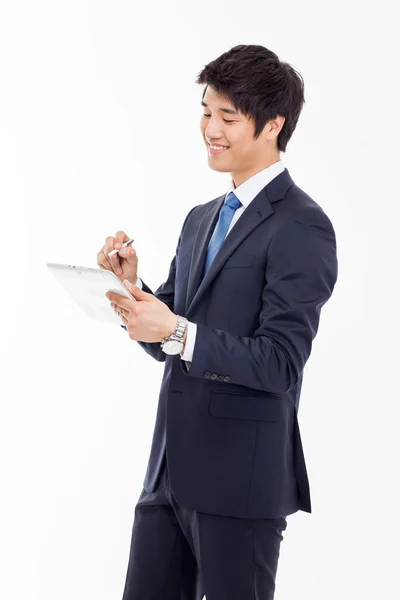 एक पैड पीसी का उपयोग करने वाला युवा एशियाई व्यवसायी — स्टॉक फ़ोटो, इमेज