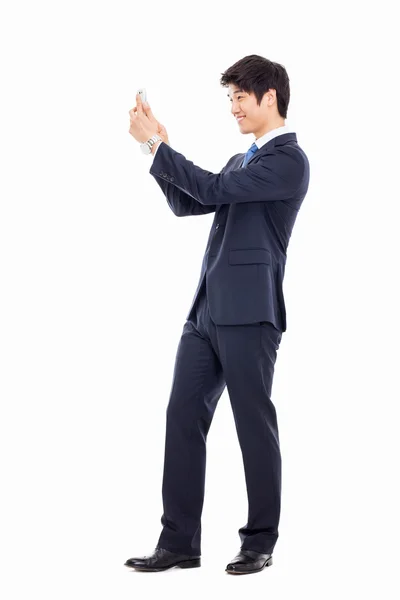 アジアのビジネスの男性と携帯電話. — ストック写真