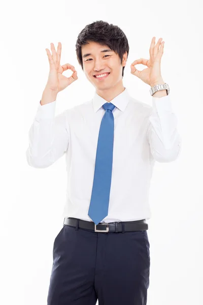 Young Asian business man showing okay sign. — Stock Photo, Image