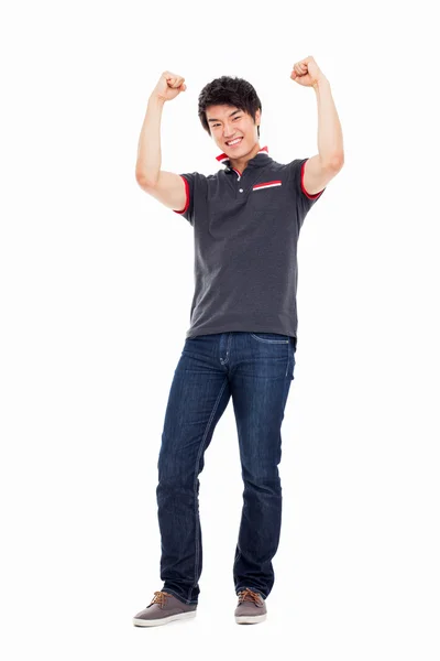 Young Asian man showing fist and happy sign. — Stock Photo, Image