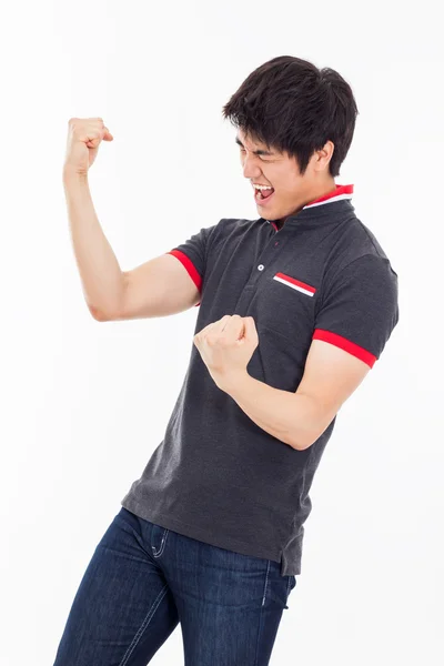 Young Asian man showing fist and happy sign. — Stock Photo, Image