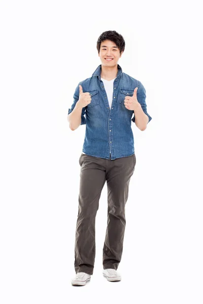 Showing thumb Asian young man — Stock Photo, Image