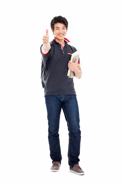 Young Asian student showing thumb — Stock Photo, Image