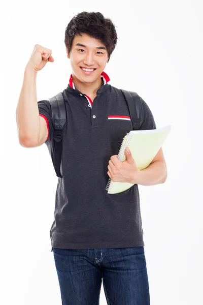 Genç Asyalı stdudent gösteren yumruk.