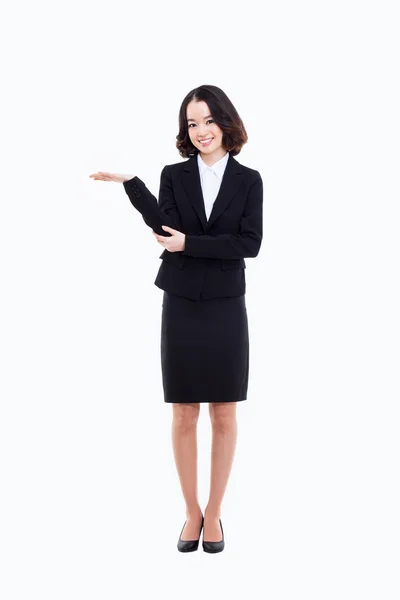 Asian business woman indicate blank space — Stock Photo, Image