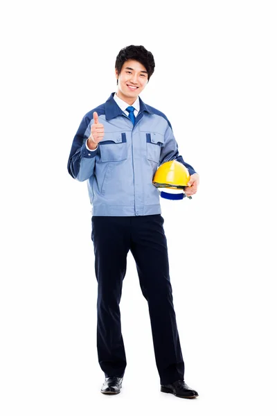 Young Asian engineer showing thumb. — Stock Photo, Image