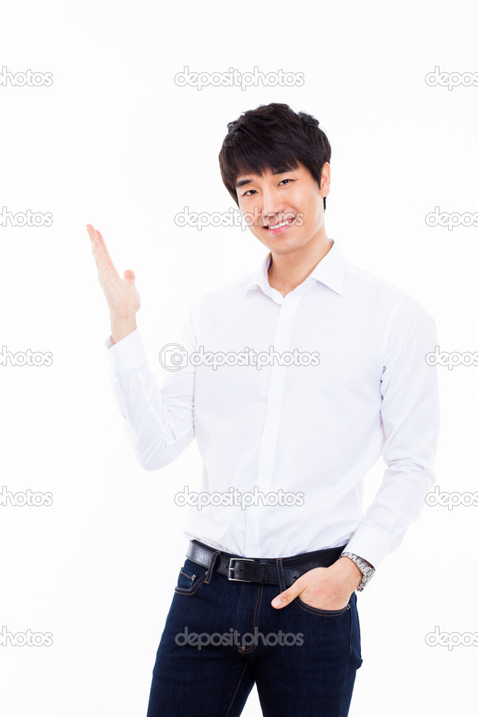 Young asian man indicated upside