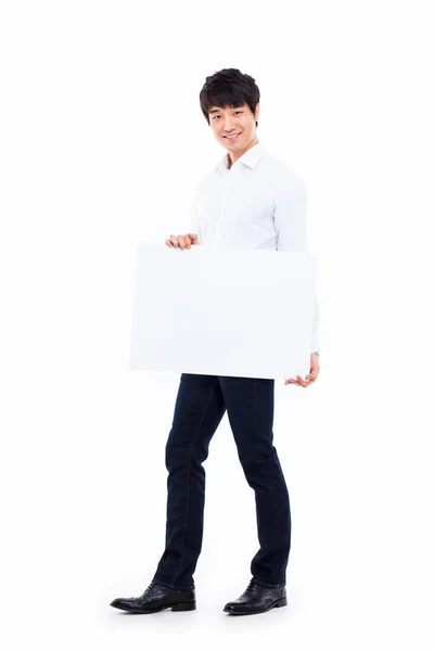 Asiatique jeune homme montrant panneau — Photo