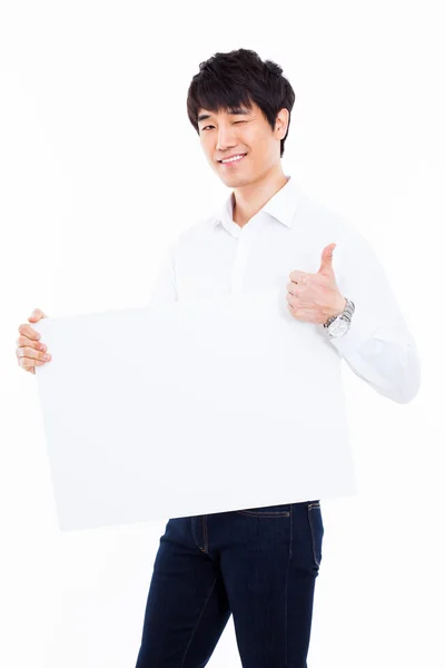 판넬 카드를 보여주는 젊은 아시아 남자 — 스톡 사진