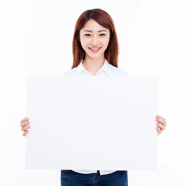 Joven asiática sosteniendo un borad blanco —  Fotos de Stock