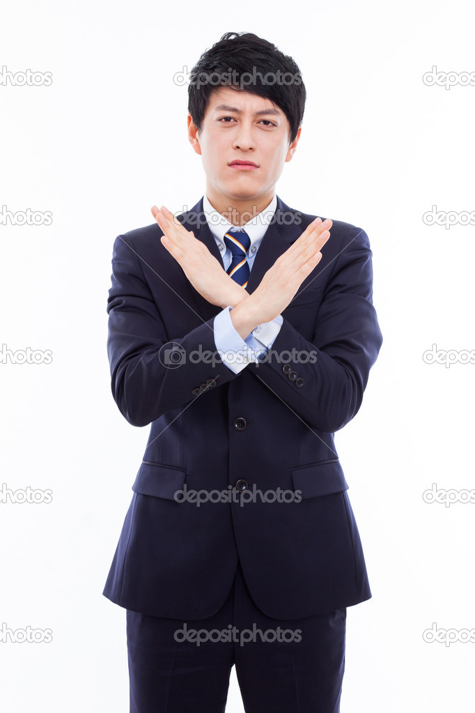 Young Asian man showing prohibit sign