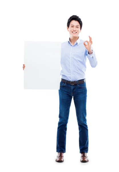 Asiático joven hombre mostrando pannel — Foto de Stock