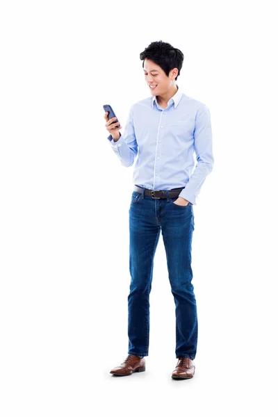 Young Asian man using phone — Stock Photo, Image