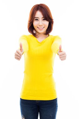 Genç Asyalı kadın gösteren başparmak.