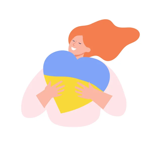 Chica abraza un corazón con los colores de la bandera de Ucrania. — Vector de stock