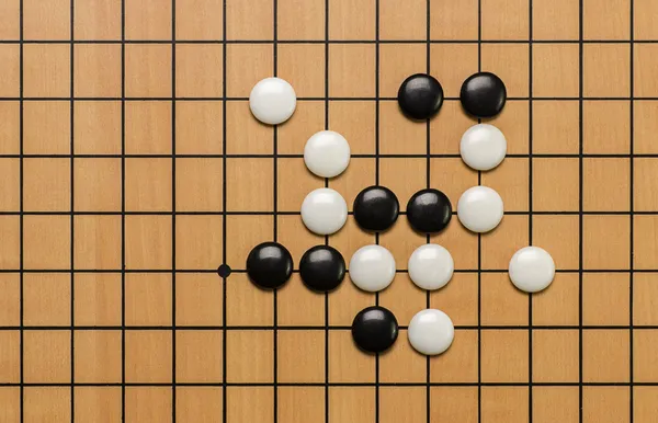 Top view on stones on a Go board — Stock Photo, Image