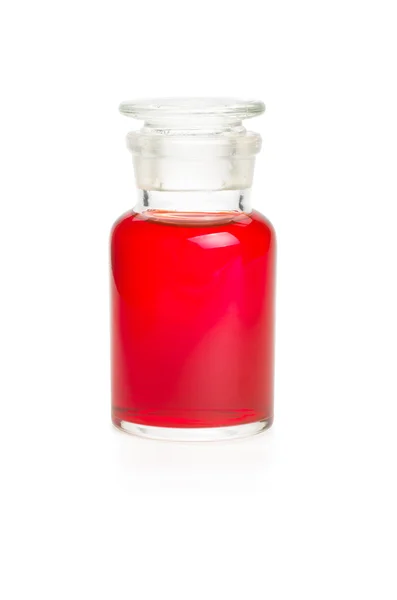 Laboratory bottle filled with red liquid — Stock Photo, Image