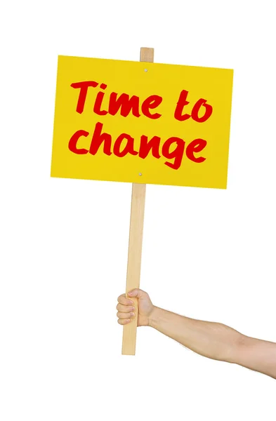 Persona sosteniendo un letrero que dice Tiempo para cambiar — Foto de Stock
