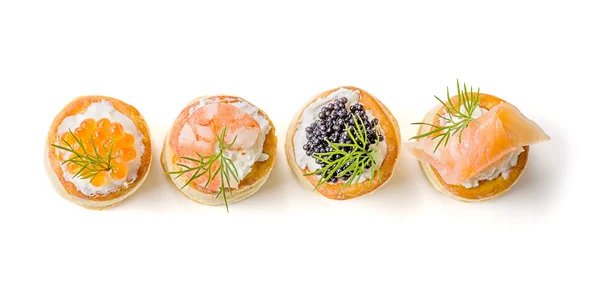 Pastries with salmon, caviar and shrimp — Stock Photo, Image