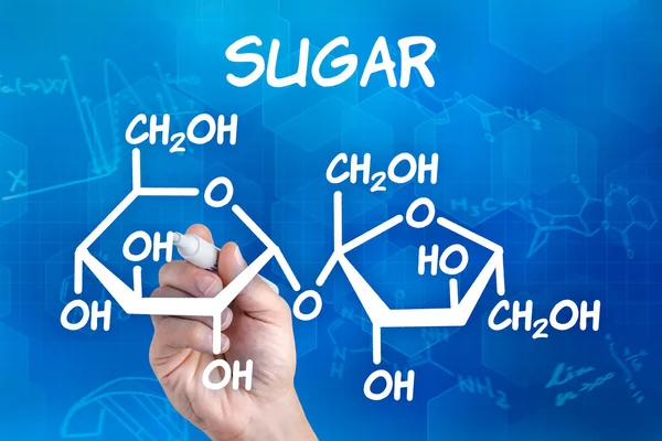 Hand mit Stift zeichnet die chemische Formel des Zuckers — Stockfoto