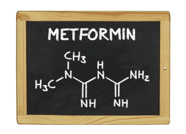 Kemiska formeln för metformin på en svart tavla — Stockfoto