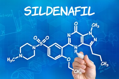 Hand with pen drawing the chemical formula of sildenafil clipart