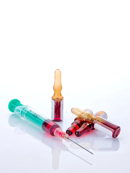 Syringe with glass vials — Stock Photo, Image