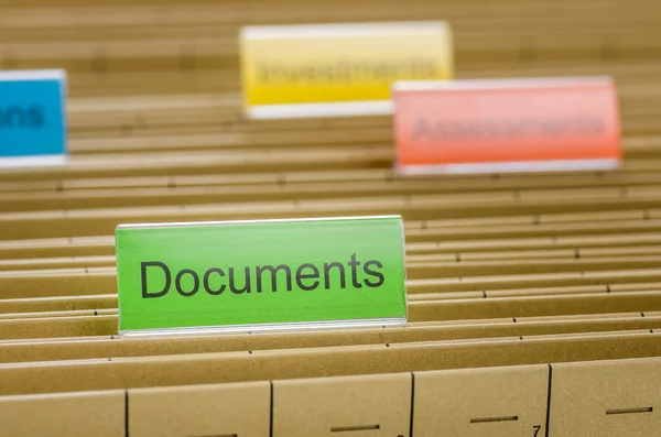 Hanging file folder labeled with Documents — Stock Photo, Image