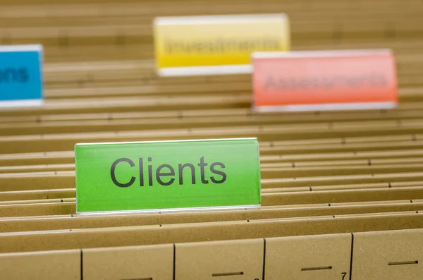 Hanging file folder labeled with Clients — Stock Photo, Image