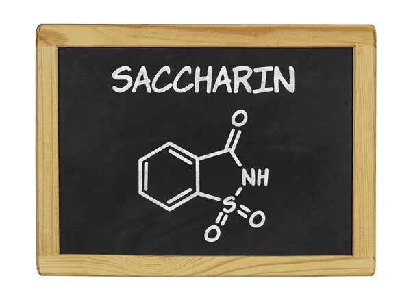Kemiska formeln för sackarin på en svart tavla — Stockfoto