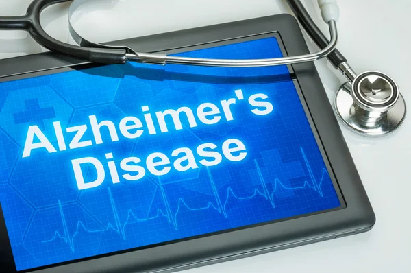 Comprimido com o diagnóstico doença de Alzheimer no visor — Fotografia de Stock