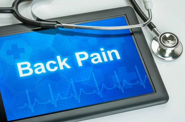 Compressa con la diagnosi di mal di schiena sul display — Foto Stock