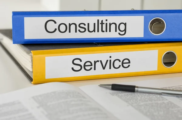 Folders with the label Consulting and Service — Stock Photo, Image