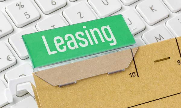 Brown File Folder Labeled Leasing — Foto de Stock