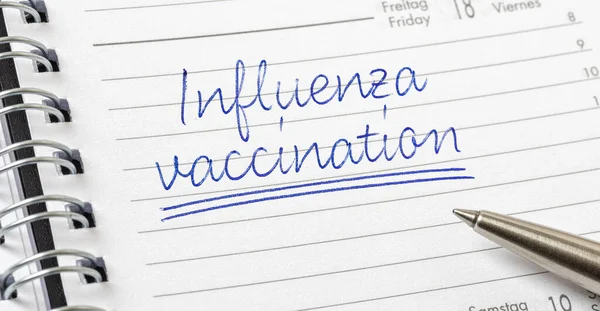 Influenza Vaccination Written Calendar Page — Stock Photo, Image