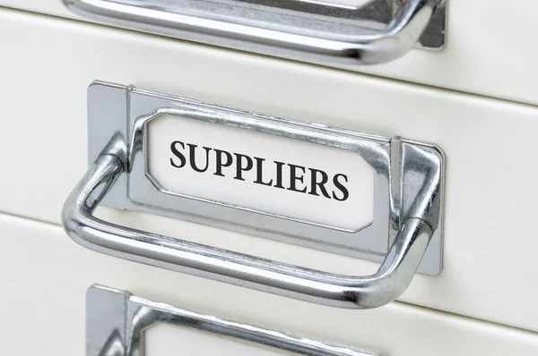 A drawer cabinet with the label Suppliers