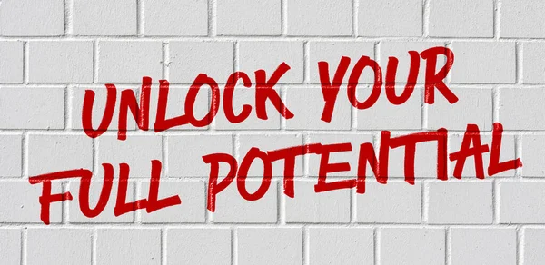 Граффити Кирпичной Стене Разблокируйте Свой Потенциал — стоковое фото