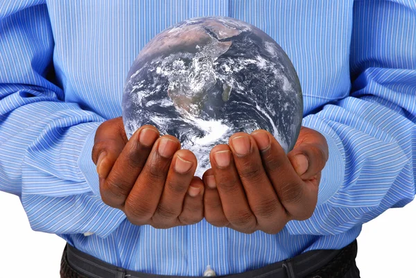 The globe in hands — Stock Photo, Image