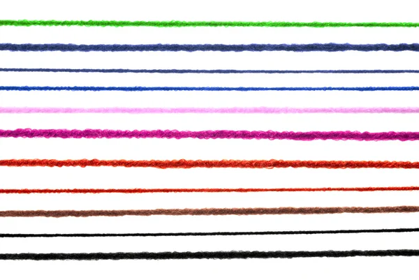 Шерстяные струны, изолированные на белом — стоковое фото