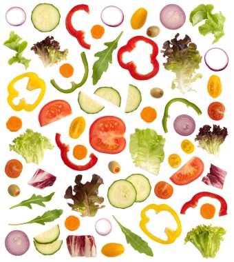 Cut raw vegetables isolated on white background clipart