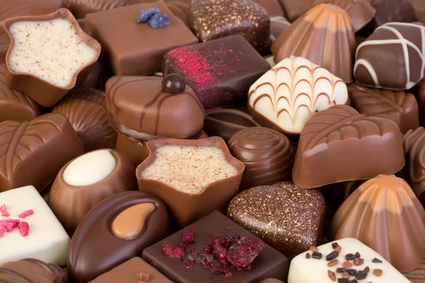 Assortment of fine chocolates. Shallow depth of field — Stock Photo, Image