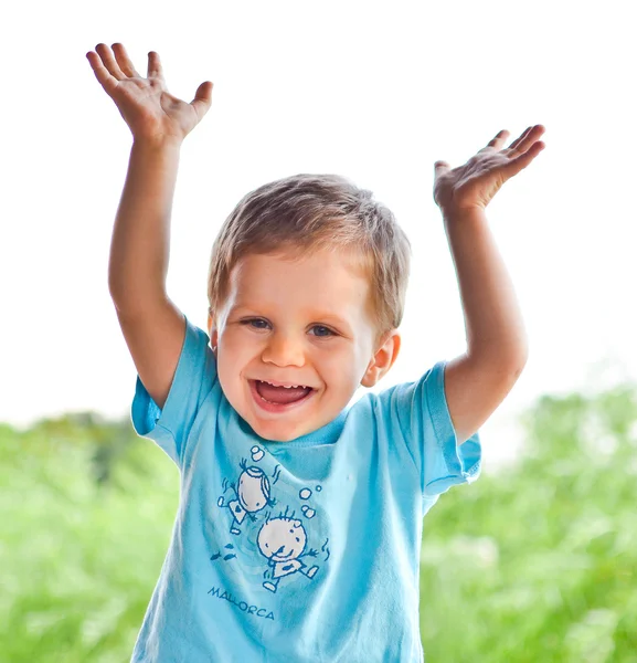 Two year old happy boy rising hands — Stock Photo, Image