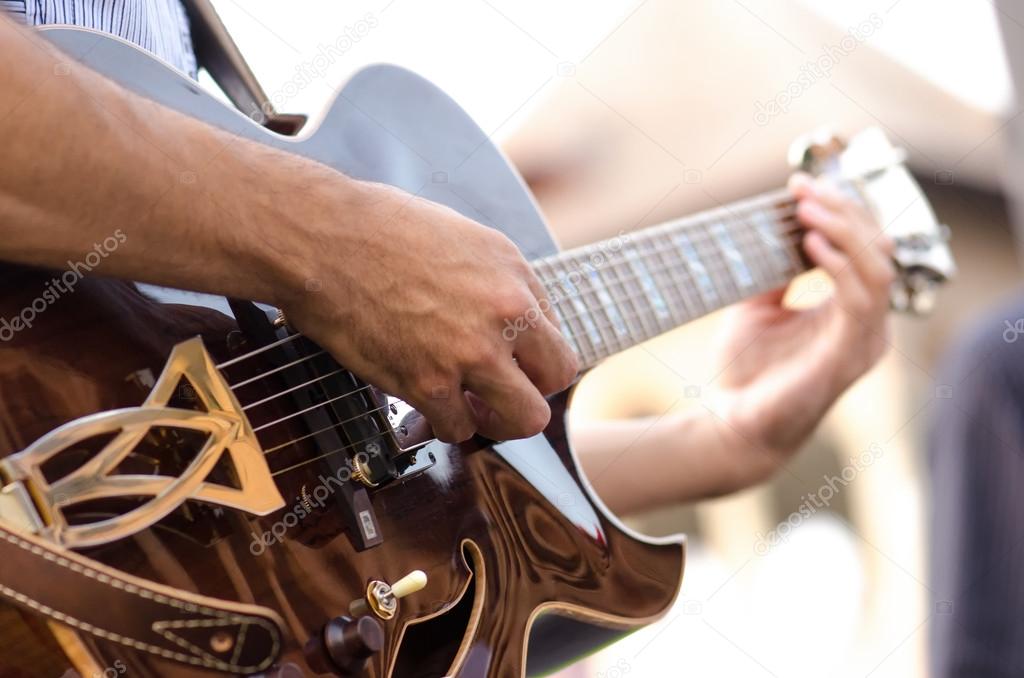 Man playing the guitar