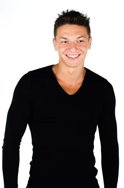 Portrait of happy young man standing against white background — Stock Photo, Image