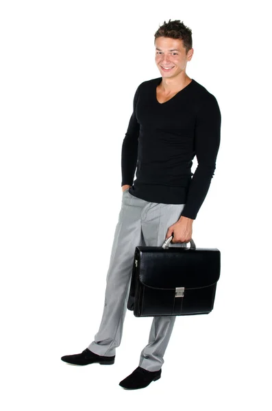 Young man with briefcase standing against white background — Stock Photo, Image