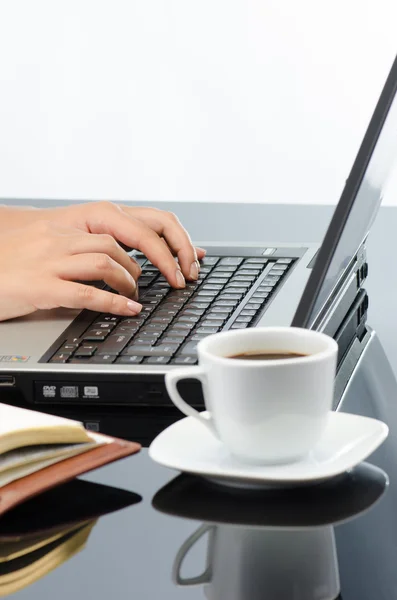 Woman's hands working on notebook keyboard — Stock Photo, Image