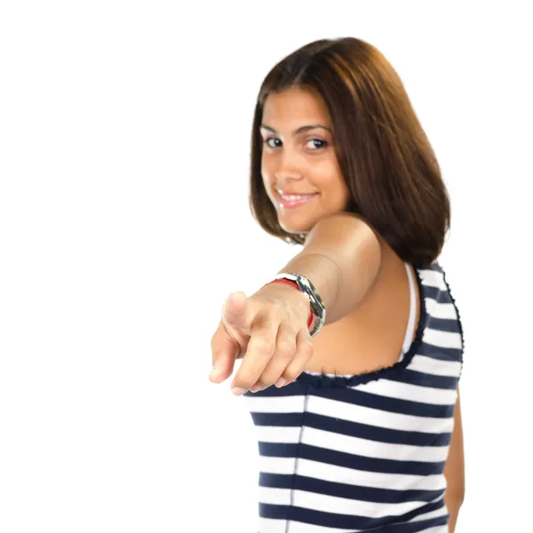 Portrait of young woman pointing with one finger — Stock Photo, Image