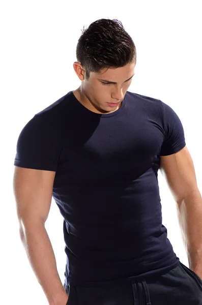 Musculoso hombre en ropa negra — Foto de Stock