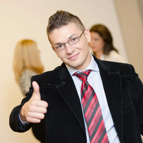 Busineesman giving you his thumb up — Stock Photo, Image